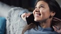 Grinning brunette talking phone close-up