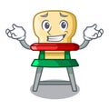 Grinning cartoon baby highchair for kids feeding Royalty Free Stock Photo