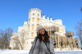 Grinning girl in front of palace Hluboka with terrace