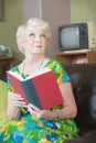 Grinning Woman with Book