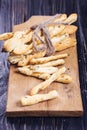 Grisini on wooden plate Royalty Free Stock Photo