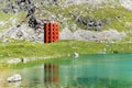 The red Julier Theater Tower on the Julier Pass