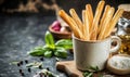Grissini breadsticks in a cup on rustic background Royalty Free Stock Photo