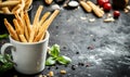 Grissini breadsticks in a cup on rustic background Royalty Free Stock Photo