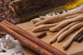 Grissini Thin Bread Sticks on wooden cutting board. Royalty Free Stock Photo