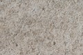 Grit stone background grey texture, top view. concrete wall background