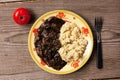 Grits, fried mushrooms and tomato