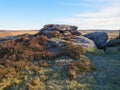 Gritstone rock formation on Curbar Edge on a frosty morning. Royalty Free Stock Photo