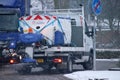 A gritter with road salt to prevent slippery asphalt of the municipality in Zuidplas during the winter