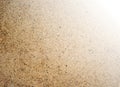 Gritty beach sand texture background with vignette Royalty Free Stock Photo