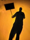 Shadow or silhouette of a protestor