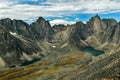 Grizzly Lake campsite surrounded by mountains in Tombstone Territorial Park, Yukon, Canada