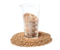 Groats spelt in a measuring cup Royalty Free Stock Photo