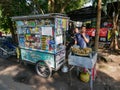 Gerobak Street Cart Selling Assorted Products and freshly cooked Bakwan