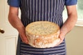 Grocer Holding Shropshire Blue Cheese Royalty Free Stock Photo