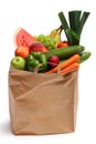 A grocery bag full of healthy fruits and vegetables Royalty Free Stock Photo