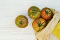 Grocery bag with tomatoes.