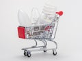 In the grocery cart are three light bulbs: incandescent, energy-saving and LED