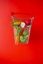 grocery consumer basket on a red background.food cost.Vegetables and fruits price increase.food crisis.supermarket Royalty Free Stock Photo