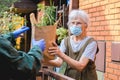 grocery delivery to senior woman during pandemic