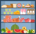 Grocery shelves. Food store assortment on refrigerator showcase, fruits and vegetables, milk and meat products, bread Royalty Free Stock Photo