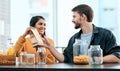 Grocery shopping in the age of Covid-19. a young couple packing their groceries into glass containers after returning Royalty Free Stock Photo