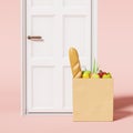 Grocery shopping bag with fresh food at the door. Mockup Royalty Free Stock Photo