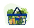 Grocery shopping basket with fresh green vegetables and root crops, celery, zucchini and carrots from local farm market. Healthy Royalty Free Stock Photo