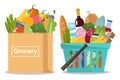 Grocery in a shopping basket and fruits and vegetables in a paper bag