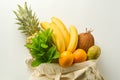 Grocery shopping with eco bag over white background. Zero waste and plastic free concept. Flat lay, top view. Copy space Royalty Free Stock Photo