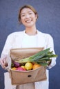 Grocery shopping, vegetables and woman with a bag in the city, supermarket food and happy with sale from the fruit store Royalty Free Stock Photo