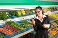 Grocery store - Business woman holding apple Royalty Free Stock Photo