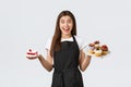 Grocery store employees, small business and coffee shops concept. Friendly smiling waitress in cafe holding plates with