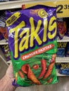 Grocery store Hand holding Taki chips crunchy fajitas