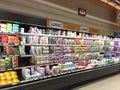 Grocery store interior dairy case aisle