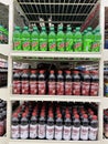 Grocery store Mtn Dew and Dr Pepper 6 pack bottles display Royalty Free Stock Photo