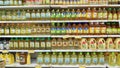 Grocery store shelves with bottles of cooking oils in a market in Johor Bahru, Malaysia Royalty Free Stock Photo