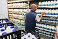 Grocery store staff packing shelves at Pick `n Pay grocery store during virus outbreak