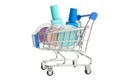 Grocery trolly with nail polishes and eyeshadow Royalty Free Stock Photo