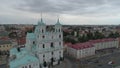 Grodna, Belarus - July, 2019: St. Francis Xavier's Cathedral and the historic buildings of Grodno's old town centre