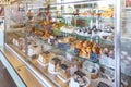 GRODNO, BELARUS - AUGUST 2019: cafeteria windows with pies, pastries, ice cream, pasties, waffles, donuts, cakes and other sweets