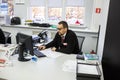 GRODNO, BELARUS - AUGUST 2017: employees to answer the call in the store at work at the computer in modern shop