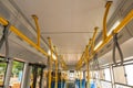 Grodno, Belarus August 30, 2022: Handrails inside the bus or subway for safe passage of passengers. Modern safe public transport.