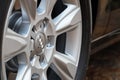 GRODNO, BELARUS - DECEMBER 2019: Audi A6 4G C7 Luxury car closeup alloy wheel part side view with titanium look matt