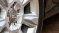 GRODNO, BELARUS - DECEMBER 2019: Audi A6 4G C7 Luxury car closeup alloy wheel part side view with titanium look matt finish 16x9