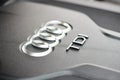 GRODNO, BELARUS - DECEMBER 2019: Audi A6 4G, C7 2.0 TDI 190 Hp 2016 Audi TDI sign logo on diesel motor compartment of
