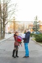 Happy father meets his wife with a newborn baby