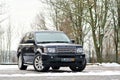 Grodno, Belarus, December 2012: Land Rover Range Rover Sport V8 Supercharged. Three quarter view of black SUV over out