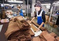 GRODNO, BELARUS - DECEMBER 13, 2013: women at factory on production of panty hoses