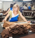 GRODNO, BELARUS - DECEMBER 13, 2013: women at factory on production of panty hoses